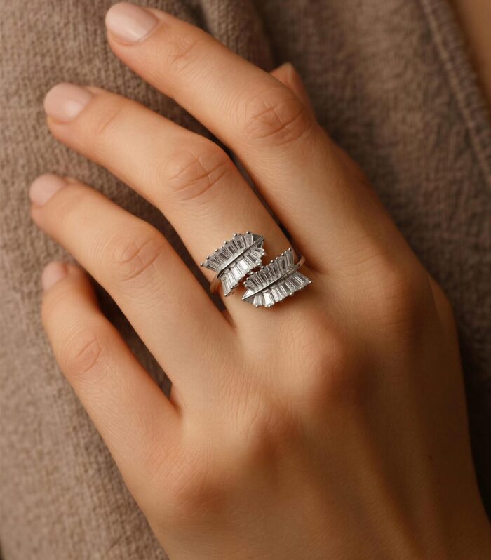 Silver wrap-style cocktail ring with baguette stones by Samaya Jewellery