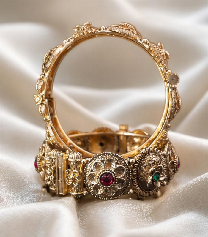 Antique gold bangle with floral medallions ruby emerald cabochons by Samaya Jewellery